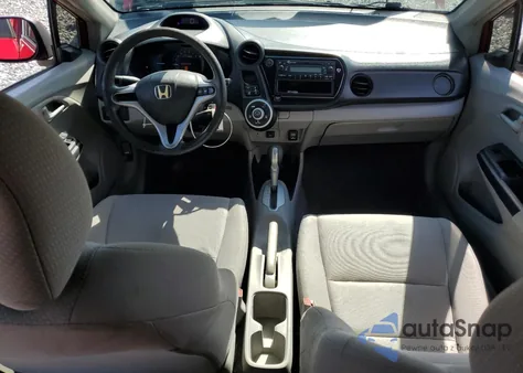 2012 Honda Insight from USA, damaged, VIN JHMZE2H30CS005628